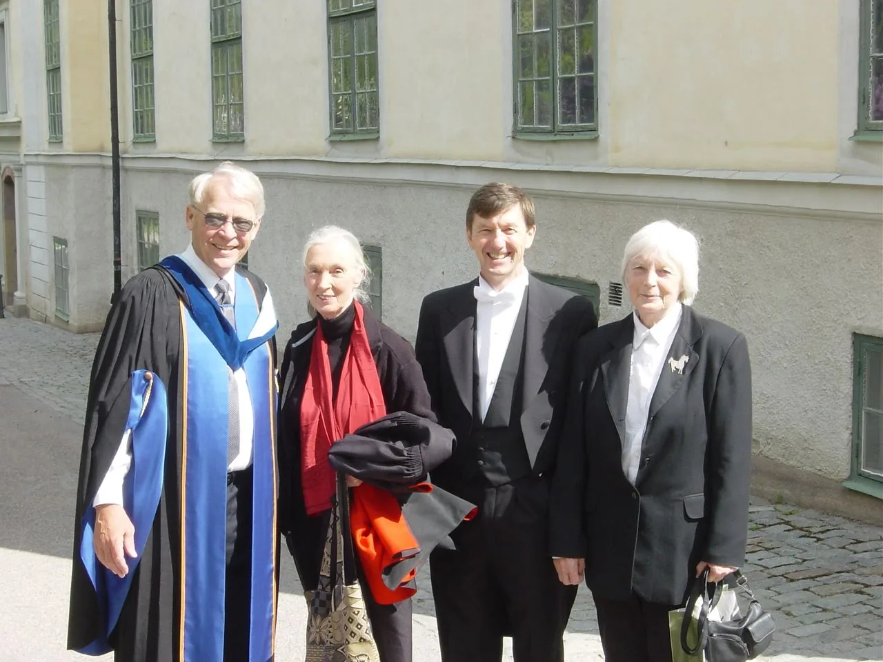Gaalen with colleagues and family at a university ceremony