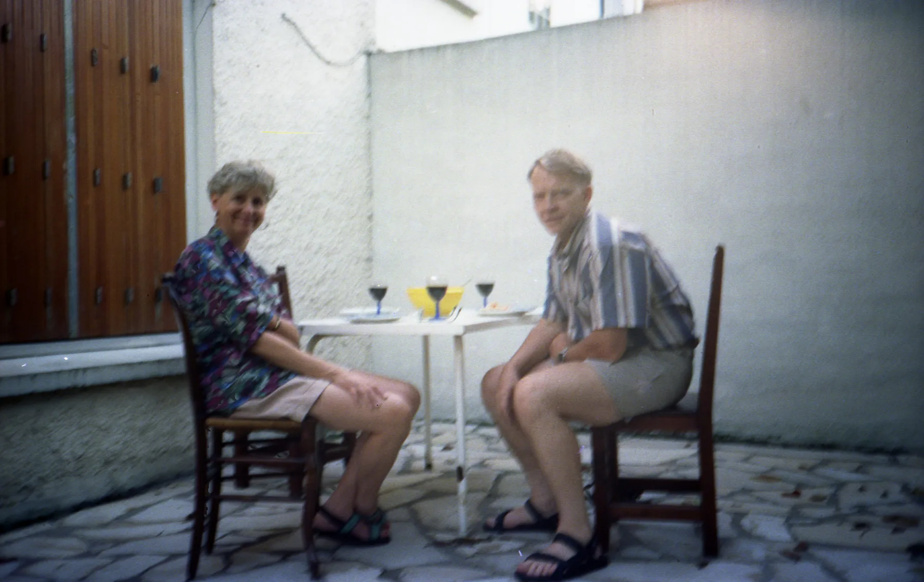 Gaalen and Lynda relaxing together on a patio