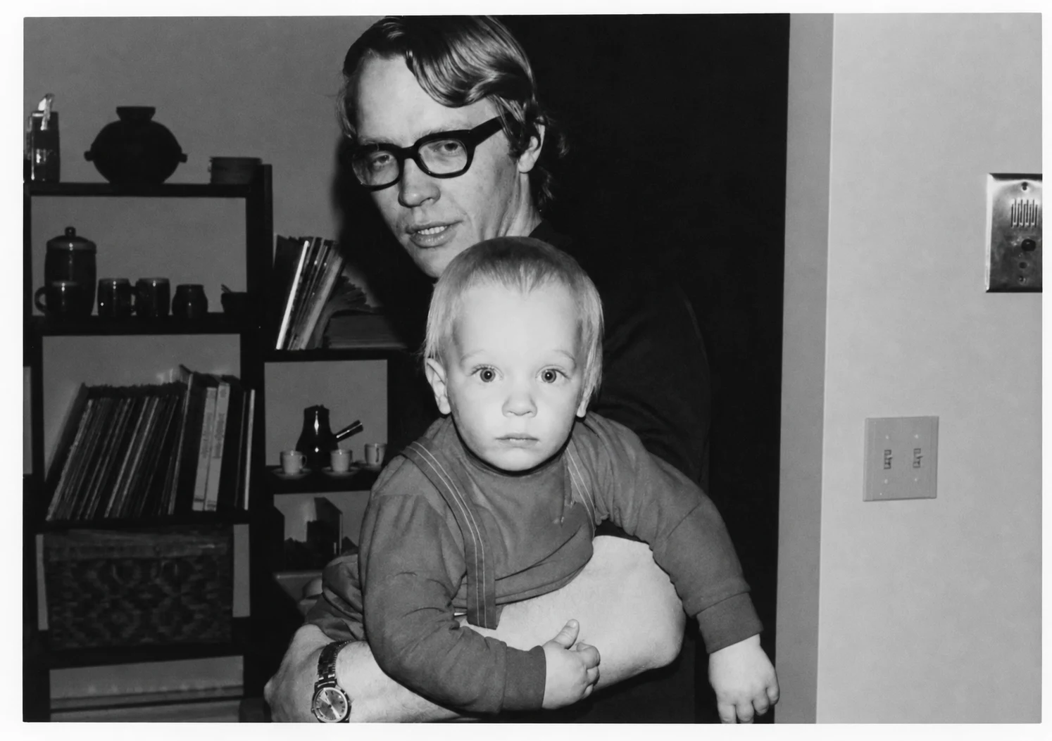 A young Gaalen holding his son, Kris